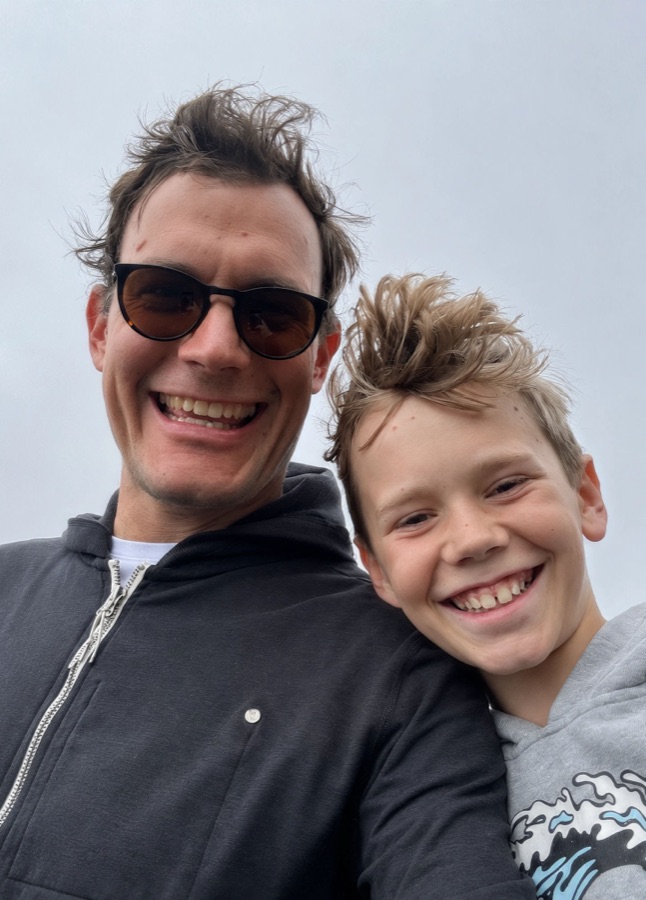 Jonatan Littke with his son at the beach